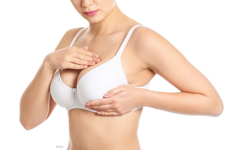 Woman's Breast Implants Fall Out After Botched Surgery
